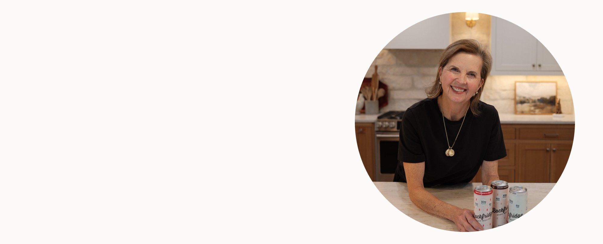 Beth Brown, co-founder of Backfridge, in her kitchen with Backfridge protein drinks